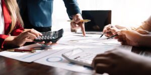 business team reviewing and analysis a diagram or chart and financial reports for a return on investment or investment risk analysis or business performance